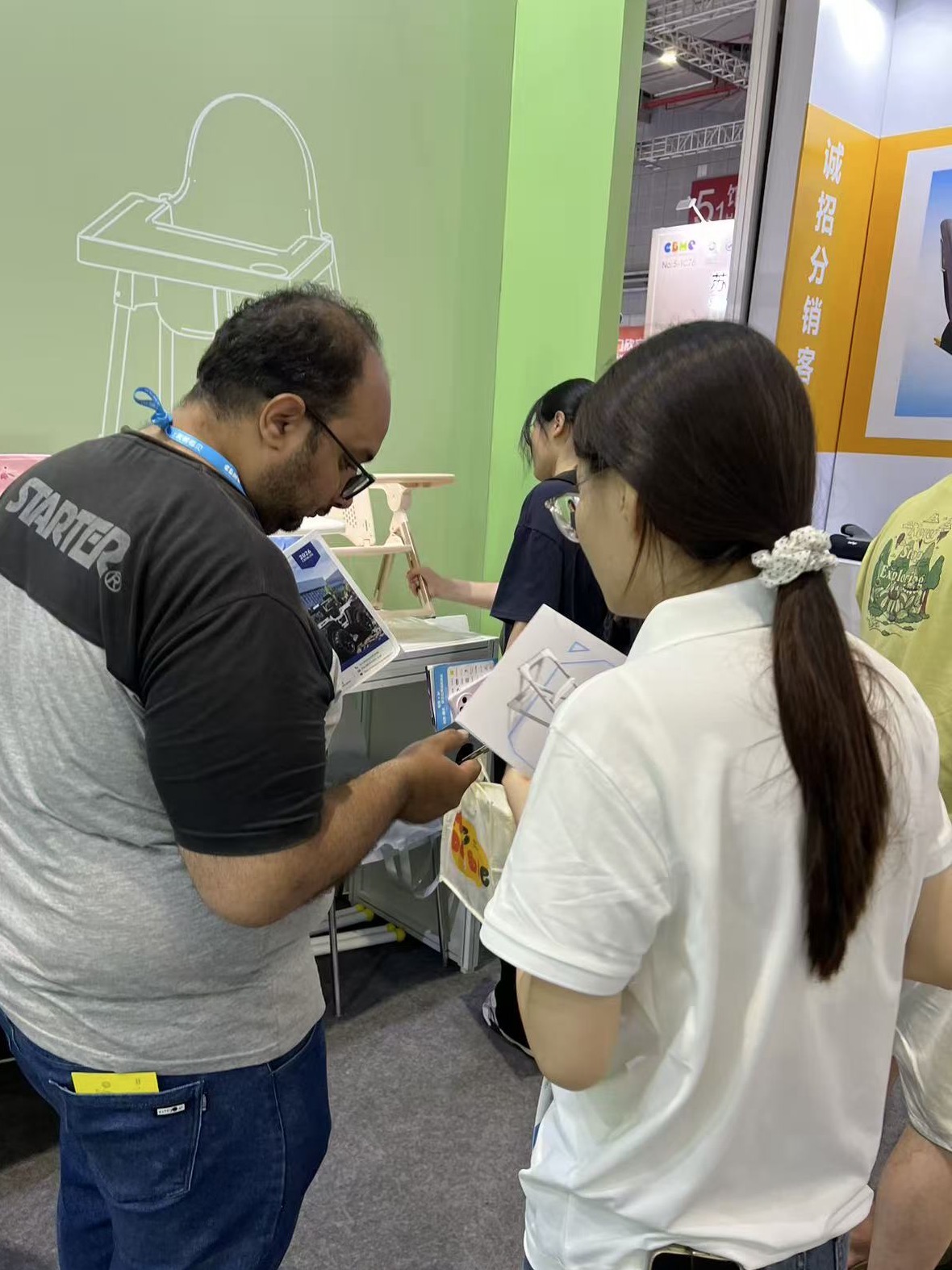 Sharing Product Details with Visitors at Our Booth